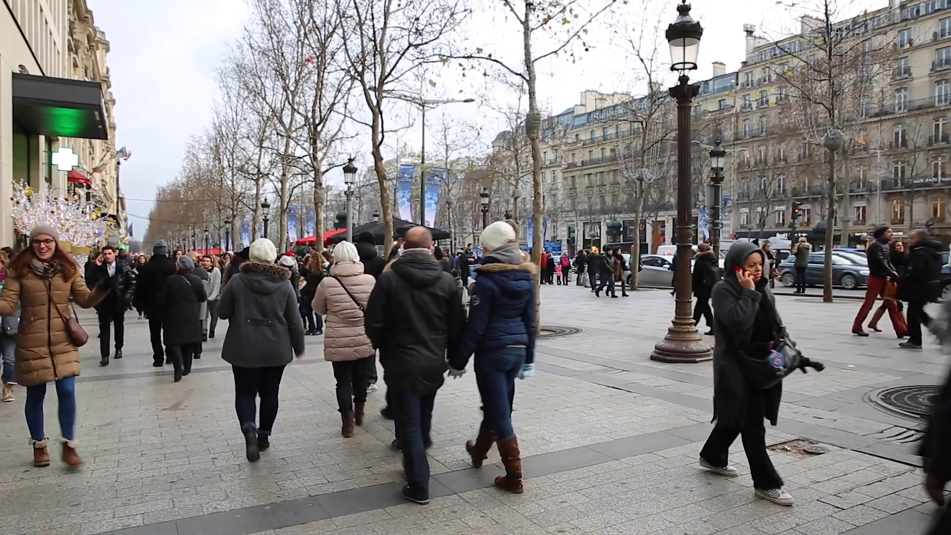 This image has an empty alt attribute; its file name is Walk-Down-Champs-Elysees.png